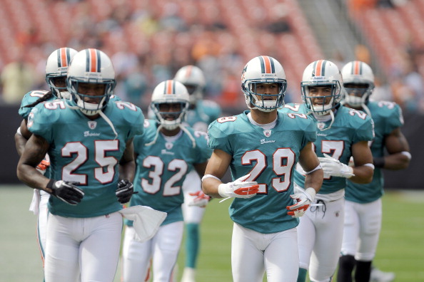 CLEVELAND, OH - SEPTEMBER 25: Members of the Miami Dolphins take the field prior to the game against the Cleveland Browns at Cleveland Browns Stadium on September 25, 2011 in Cleveland, Ohio. (Photo by Jason Miller/Getty Images)