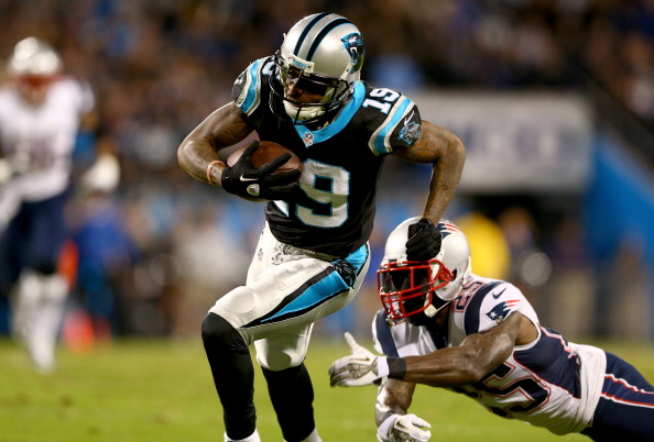 CHARLOTTE, NC - NOVEMBER 18: Ted Ginn #19 of the Carolina Panthers runs for a touchdown after breaking a tackle from Kyle Arrington #25 of the New England Patriots during their game at Bank of America Stadium on November 18, 2013 in Charlotte, North Carolina. (Photo by Streeter Lecka/Getty Images)