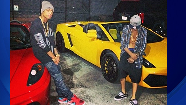 Khalil Amir Sharieff aka Crazy Khalil and Justin Bieber in front of the red Ferrari and yellow Lamborgini prior to their arrests in Miami Beach. (Source: Instagram/JustinBieber)