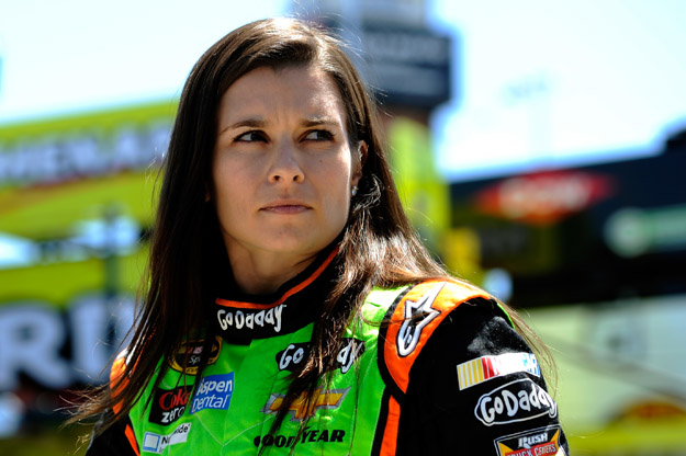 KANSAS CITY, KS - MAY 09:  Danica Patrick, driver of the #10 GoDaddy Chevrolet, stands in the garage area during practice for the NASCAR Sprint Cup Series 5-Hour Energy 400 at Kansas Speedway on May 9, 2014 in Kansas City, Kansas.
