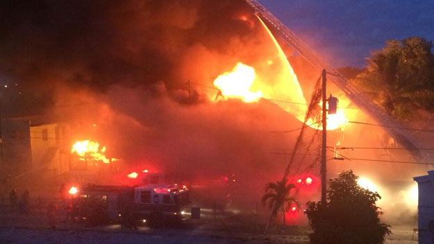 May 30, 2014: Firefighters worked to extinguish a fire on NW 14 Terrace.  (Source: Gaby Fleischman, CBS4)