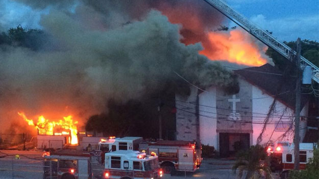 May 30, 2014: A fire at NW 14 Terrace destroyed a home and damaged a church.  (Source: Gaby Fleischman, CBS4)