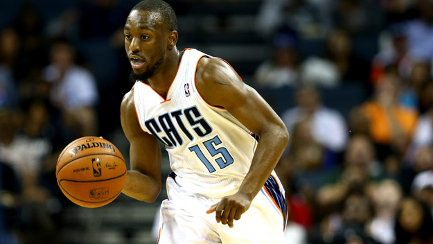 CHARLOTTE, NC - APRIL 28:  Kemba Walker #15 of the Charlotte Bobcats against the Miami Heat in Game Four of the Eastern Conference Quarterfinals during the 2014 NBA Playoffs at Time Warner Cable Arena on April 28, 2014 in Charlotte, North Carolina. (Photo by Streeter Lecka/Getty Images)