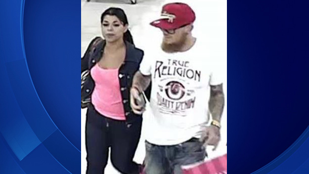 Couple pictured here are suspected of stealing watches at Bloomingdales in Sawgrass Mills Mall. (Source: Sunrise Police)