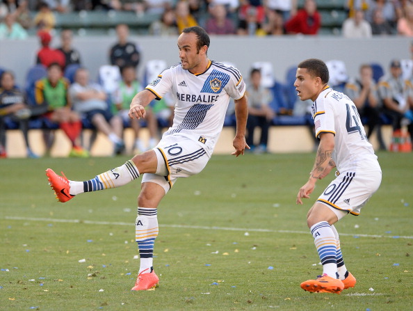  Landon Donovan #10 of Los Angeles Galaxy watches his goal with Raul Mendiola #40 during the second half against the Philadelphia Union at StubHub Center on May 25, 2014 in Los Angeles, California.  (credit: Harry How/Getty Images)