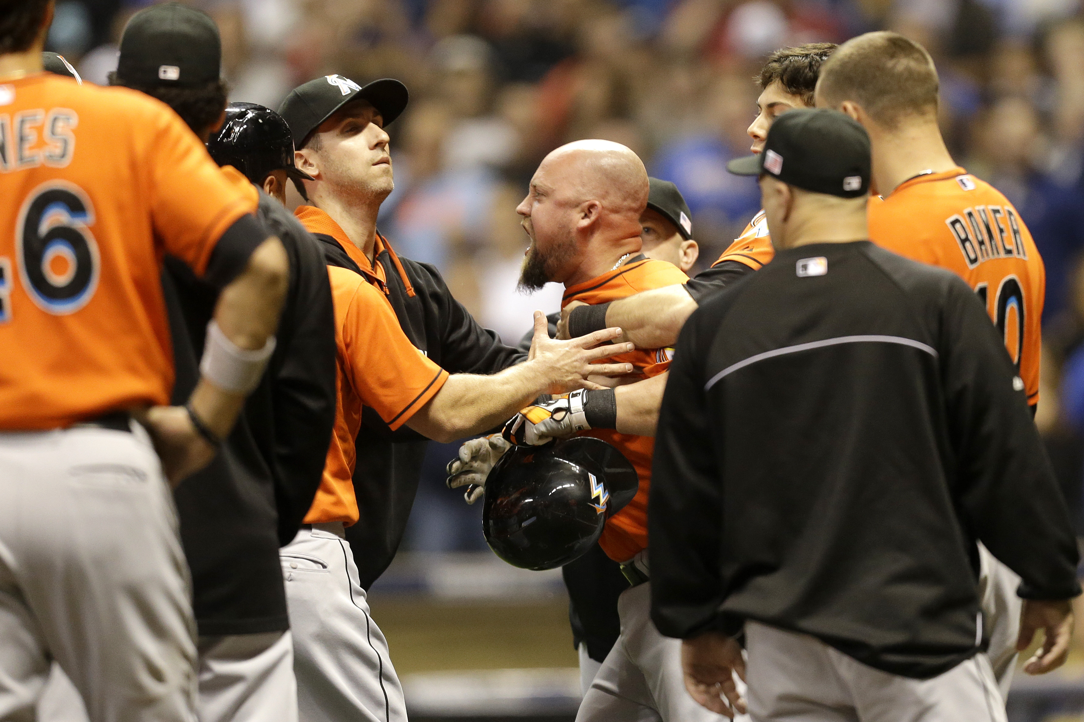MILWAUKEE, WI - SEPTEMBER 11: Casey McGehee #9 of the Miami Marlins yells at Mike Fiers of the Milwaukee Brewers at Miller Park on September 11, 2014 in Milwaukee, Wisconsin. (Photo by Mike McGinnis/Getty Images)