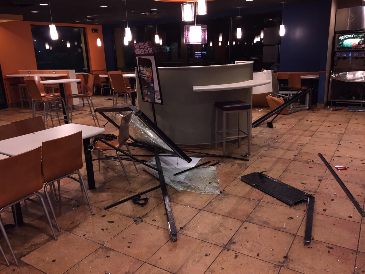 A car slammed into a Coral Springs Taco Bell overnight on February 28, 2015. (Courtesy: Coral Springs Fire Department)