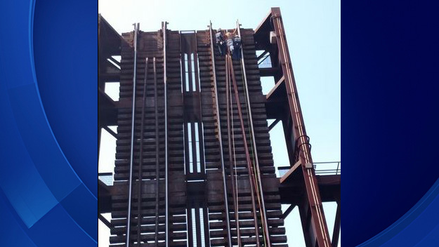 Crews conducted a daring rescue of a man found naked and trapped on a Fort Lauderdale railway bridge 100-feet high on May 22, 2015. (Source: Fort Lauderdale Fire Rescue)