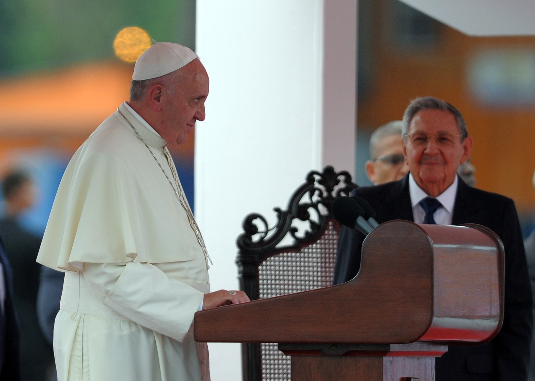 Pope Francis (L) stands next to Cuban President Raul Castro during his welcome ceremony upon landing at Havana's international airport on September 19, 2015, on the first leg of a high-profile trip that will also take him to the United States. AFP PHOTO / Yamil Lage        (Photo credit should read YAMIL LAGE/AFP/Getty Images)