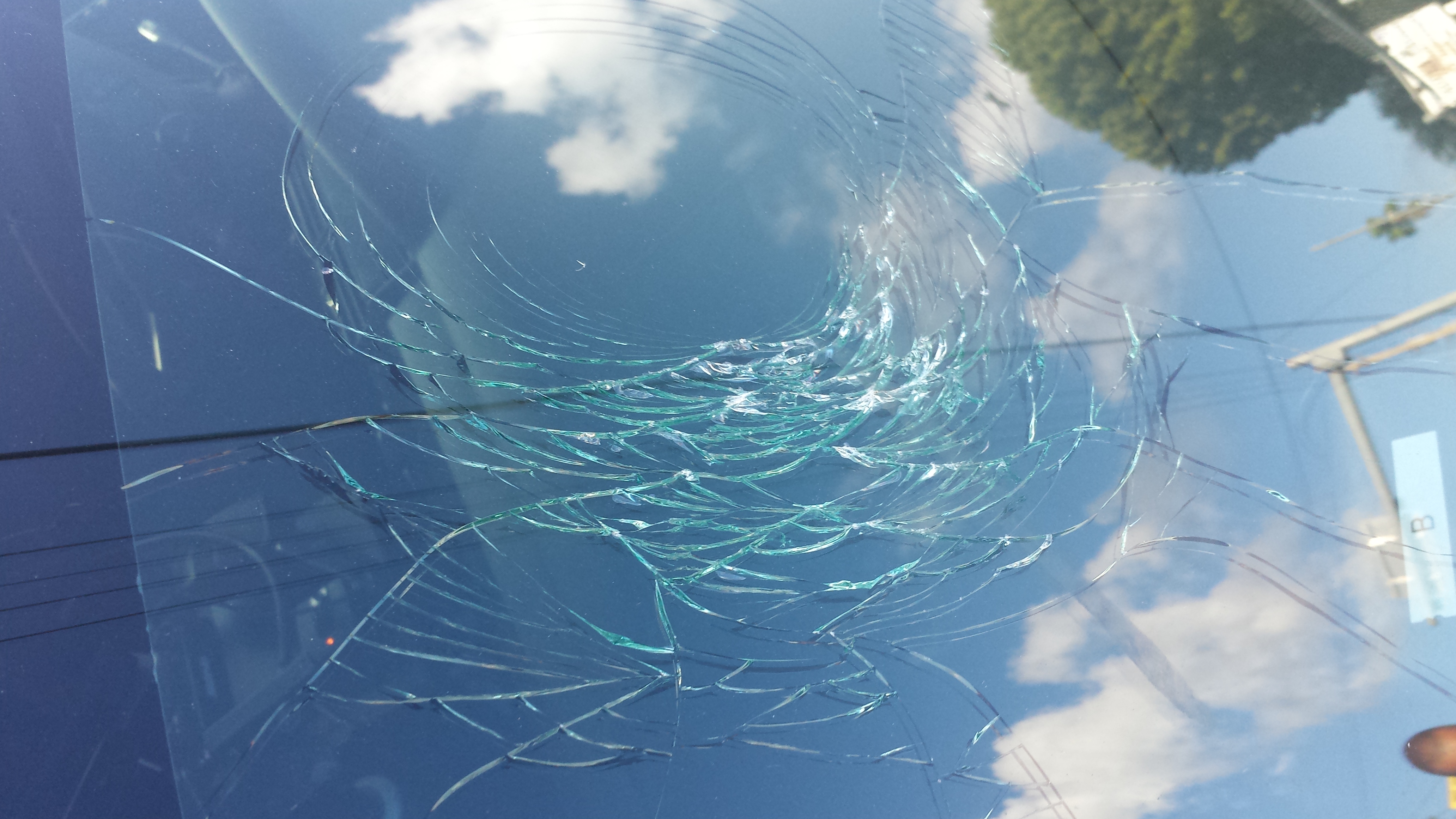 Shattered windshield on Opa-locka police cruiser. (Source: Miami-Dade Police) 