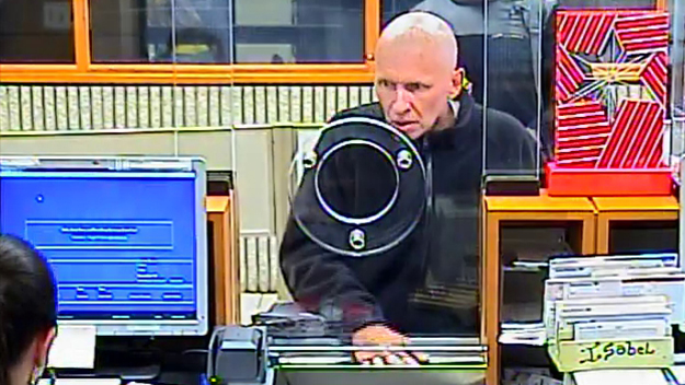Police say this photo shows David Winesett, 51, attempting to rob a Bank of America on Miami Beach. (Source: FBI Miami)