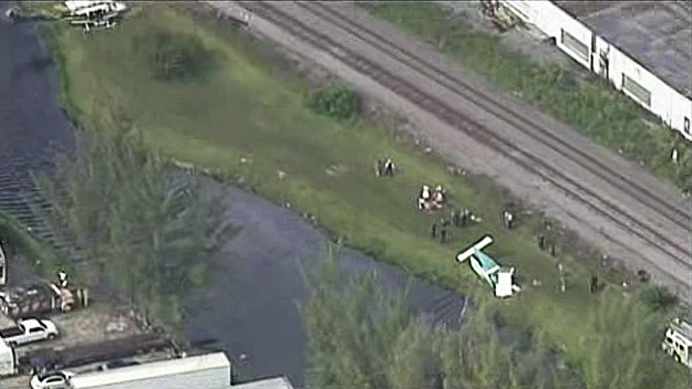 A plane went down in Opa Locka, injuring a number of people on Dec. 1, 2015. (Source: CBS4) 