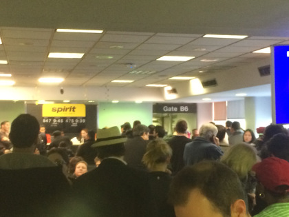 A crowded gate at LaGuardia Airport after passengers were evacuated from a Spirit Airlines flight on Dec. 26, 2015. (Source: Zach Staggers)
