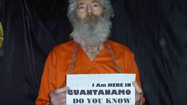Retired FBI agent Robert Levinson seen captive in this undated photograph. (Source: Levinson Family)