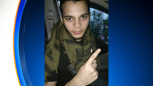 Suspected Fort Lauderdale airport shooter Esteban Santiago displaying what's believed to be an ISIS gesture. (Source: Twitter)