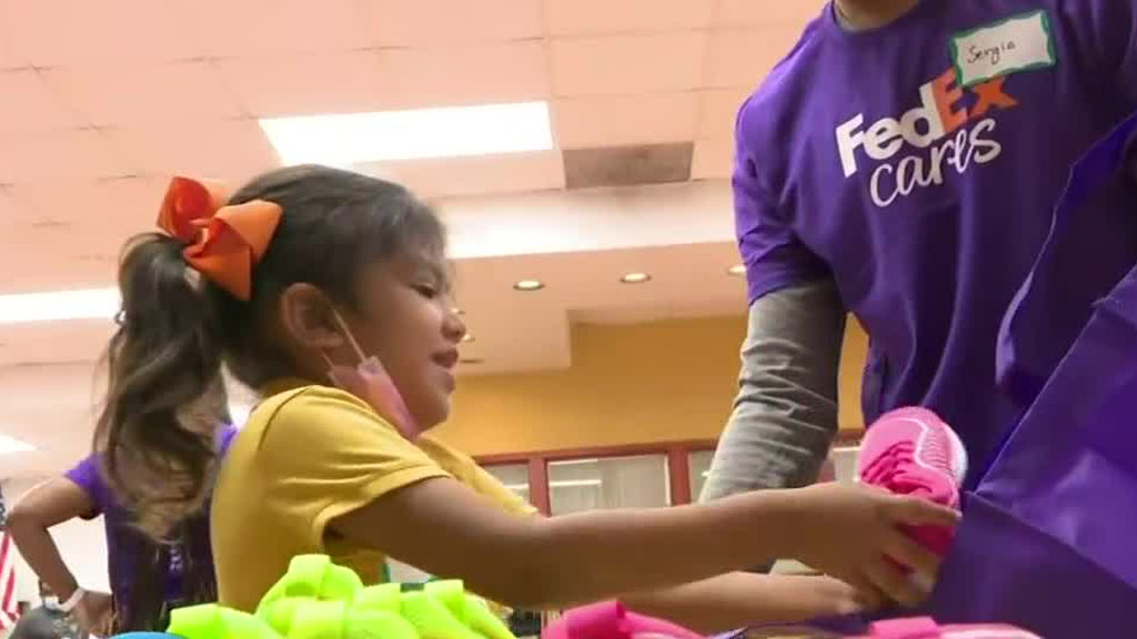 Sneaker Surprise For 200 Students At NW Dade School