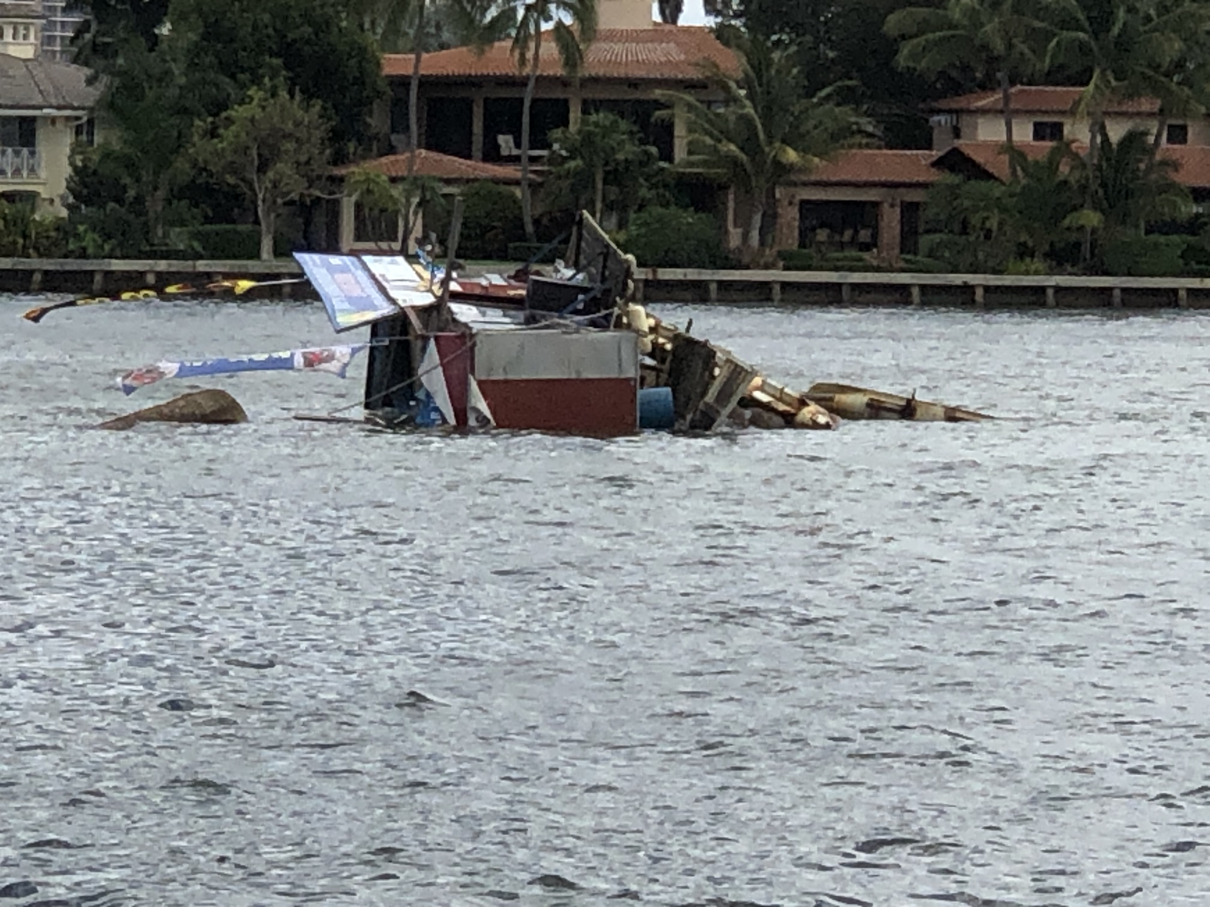 Popular Jay’s Sandbar Food Boat Tipped Over, Partially Sunk After Loosing Pontoon