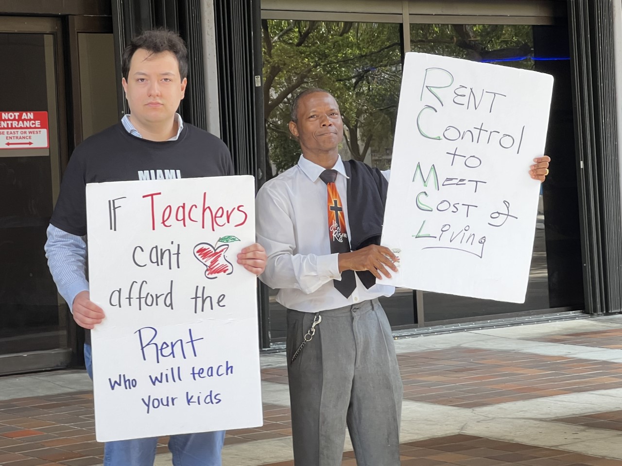 Catalyst staff member Bryan Hernandez protests with community members in support of the TBOR.